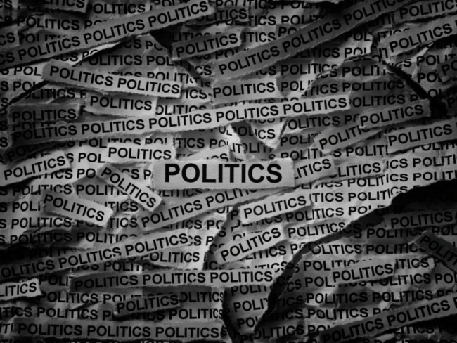 Strips-of-newspaper-with-the-words-Politics-typed-on-them-1024×768
